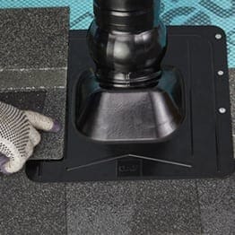 GAF contractor shingling around the Master Flow Pivot roof pipe boot.